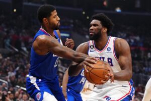 Philadelphia 76ers' Interest In 1 West All-Star Is 'NBA's Worst-Kept Secret' 3 Jan 17, 2023; Los Angeles, California, USA; Philadelphia 76ers center Joel Embiid (21) is fouled by LA Clippers guard Paul George (13) in the first half at Crypto.com Arena. Mandatory Credit: Kirby Lee-USA TODAY Sports