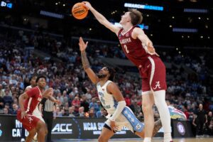 Alabama Crimson Tide: Assessing The First Month Of The Season For No. 10 Alabama After Their Loss To Oregon 3 Mar 28, 2024; Los Angeles, CA, USA; Alabama Crimson Tide forward Grant Nelson (2) blocks North Carolina Tar Heels guard RJ Davis (4) in the second half in the semifinals of the West Regional of the 2024 NCAA Tournament at Crypto.com Arena. Mandatory Credit: Kirby Lee-USA TODAY Sports