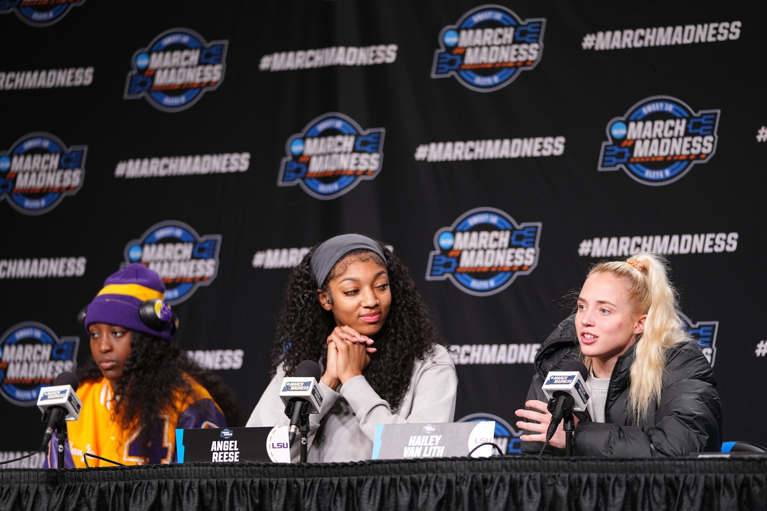 "HVL": Angel Reese Gives Shoutout To Hailey Van Lith's Sweet 16 Heroics 1 LSU Tigers guard Flau'jae Johnson (4) forward Angel Reese (10) and guard Hailey Van Lith (11) take questions from the media at MVP Arena, Sunday, March 31, 2024 in Albany, N.Y.