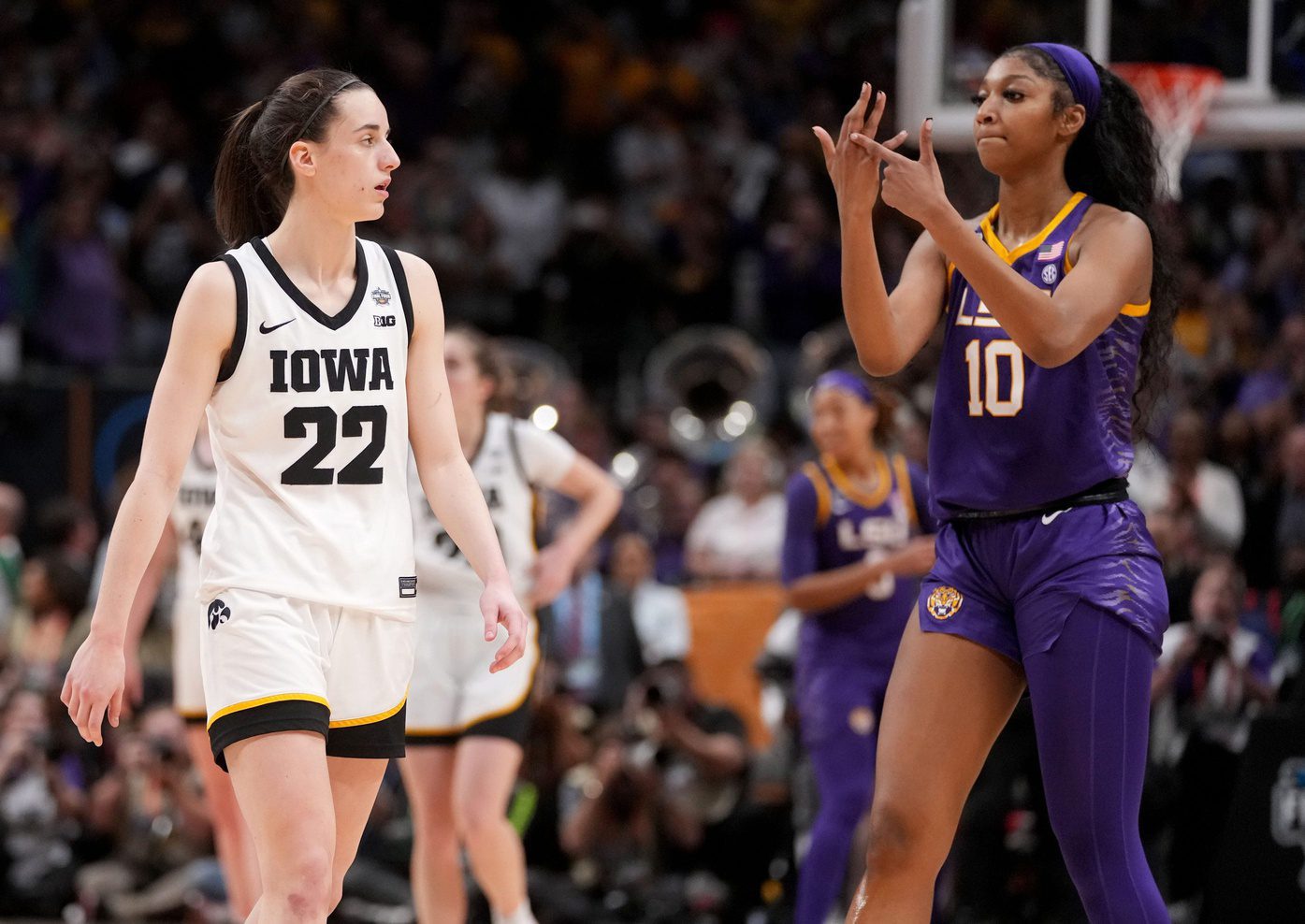 WATCH: Caitlin Clark, Angel Reese Share Sweet Moment After Heated Elite 8 Showdown 1 Caitlin Clark, Angel Reese