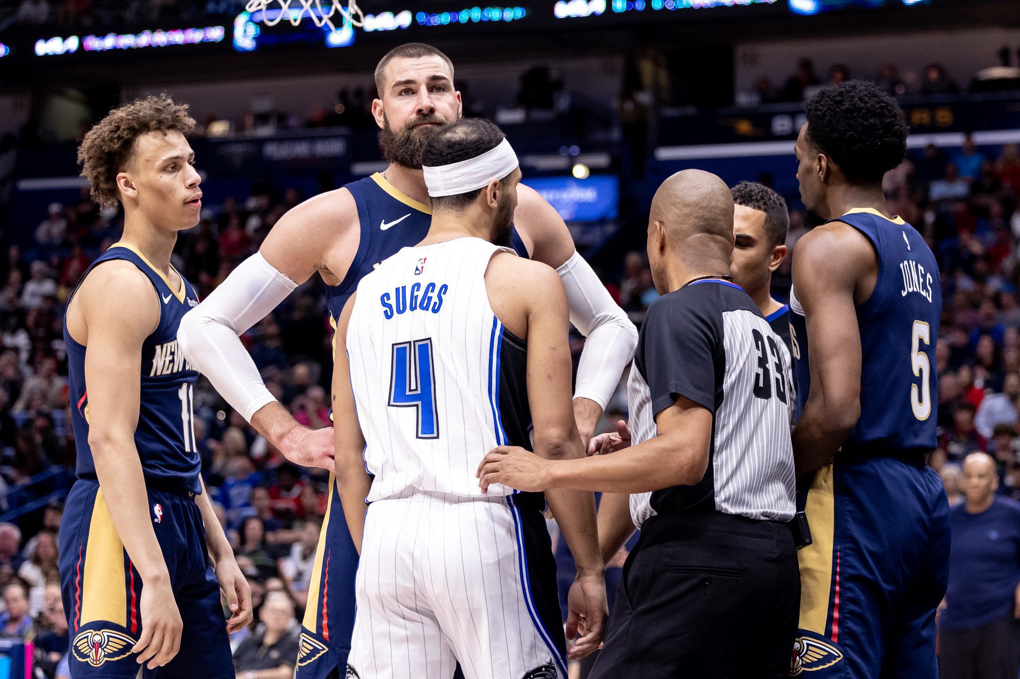 Orlando Magic: Jalen Suggs' New Injury Update Will Have Fans Excited Ahead of 2025-26 3 Apr 3, 2024; New Orleans, Louisiana, USA; New Orleans Pelicans center Jonas Valanciunas (17) stands between forward Herbert Jones (5) and Orlando Magic guard Jalen Suggs (4) after a play during the first half at Smoothie King Center. Mandatory Credit: Stephen Lew-USA TODAY Sports