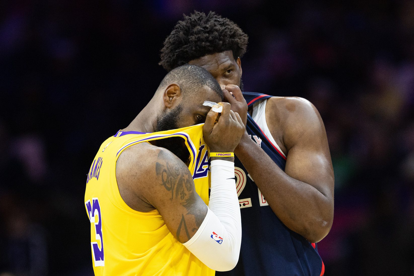 ESPN Urged To Make Tom Brady-Like Move on LeBron James Once Los Angeles Lakers Retires 2 Nov 27, 2023; Philadelphia, Pennsylvania, USA; Philadelphia 76ers center Joel Embiid (21) talks with Los Angeles Lakers forward LeBron James (23) during the second quarter at Wells Fargo Center. Mandatory Credit: Bill Streicher-USA TODAY Sports
