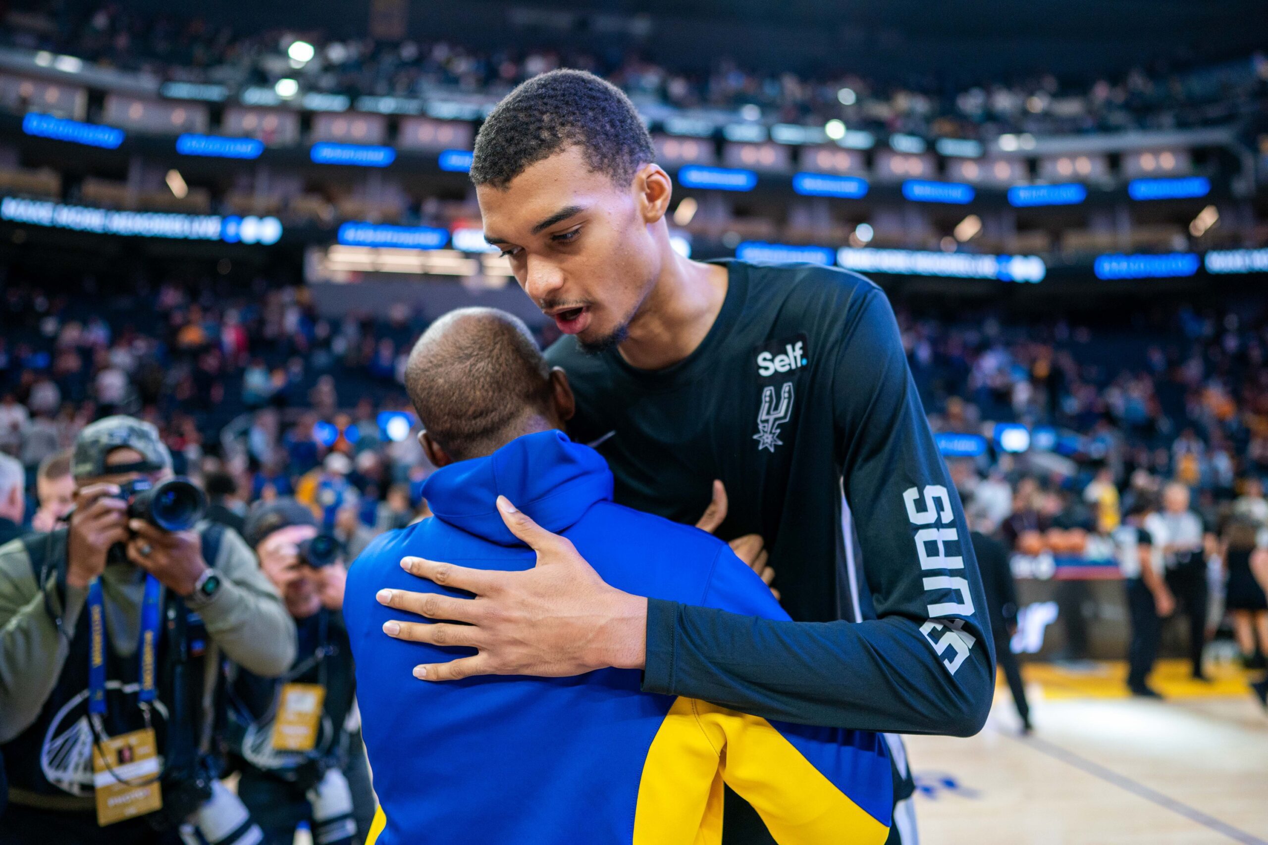 Former San Antonio Spurs Journeyman Drops Hilarious Reaction to Chris Paul's 2024 Free Agency Signing 3 October 20, 2023; San Francisco, California, USA; Golden State Warriors guard Chris Paul (3, left) shakes hands with San Antonio Spurs center Victor Wembanyama (1, right) after the game at Chase Center. Mandatory Credit: Kyle Terada-USA TODAY Sports