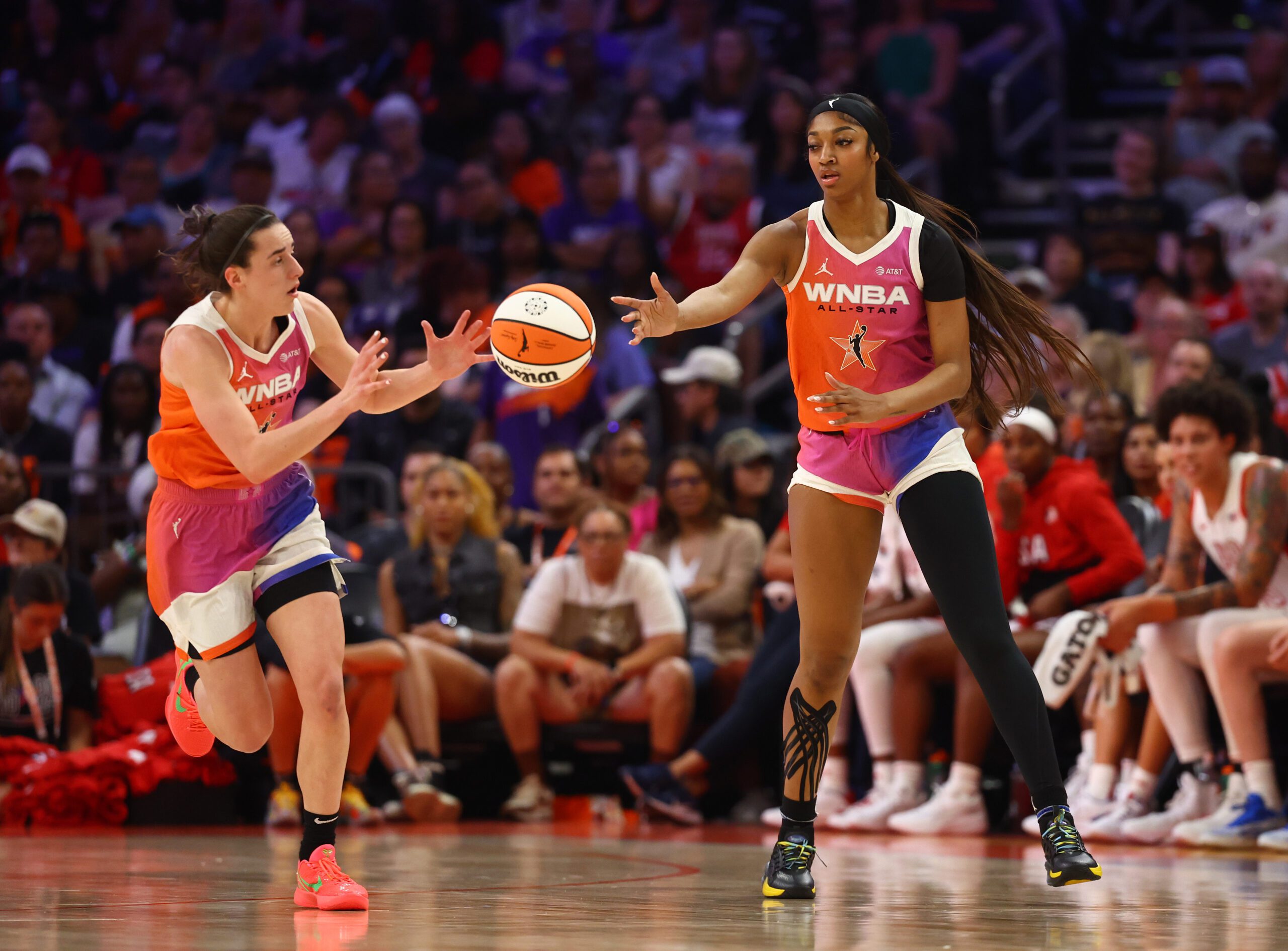 LOOK: Caitlin Clark Asks Teammate To Throw T-Shirt To A Bucks Fan's Face 3 Angel Reese, Caitlin Clark