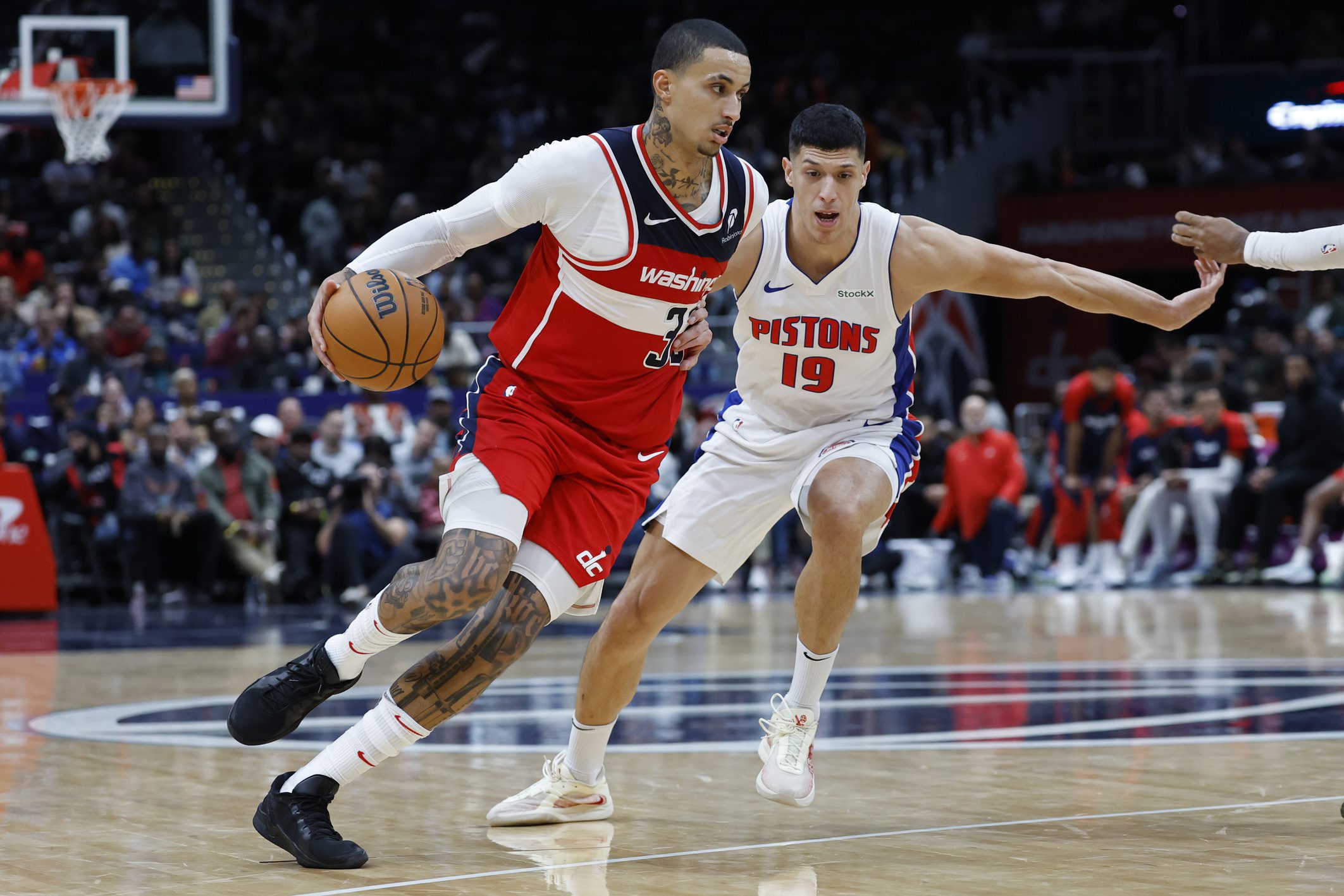 Milwaukee Bucks: Khris Middleton and Kyle Kuzma Trade Shocks Fans 1 Nov 17, 2024; Washington, District of Columbia, USA; Washington Wizards forward Kyle Kuzma (33) drives to the basket as Detroit Pistons forward Simone Fontecchio (19) defends in the second half at Capital One Arena. Mandatory Credit: Geoff Burke-Imagn ImagesBucks