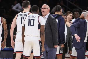 "Ushering These Young Adults" UConn's Dan Hurley Sees Entire Fan Base Turn On Him (Report) 3 Dec 14, 2024; New York, New York, USA; Connecticut Huskies head coach Dan Hurley celebrates with guard Hassan Diarra (10) during a timeout in the second half against the Gonzaga Bulldogs at Madison Square Garden. Mandatory Credit: Wendell Cruz-Imagn Images