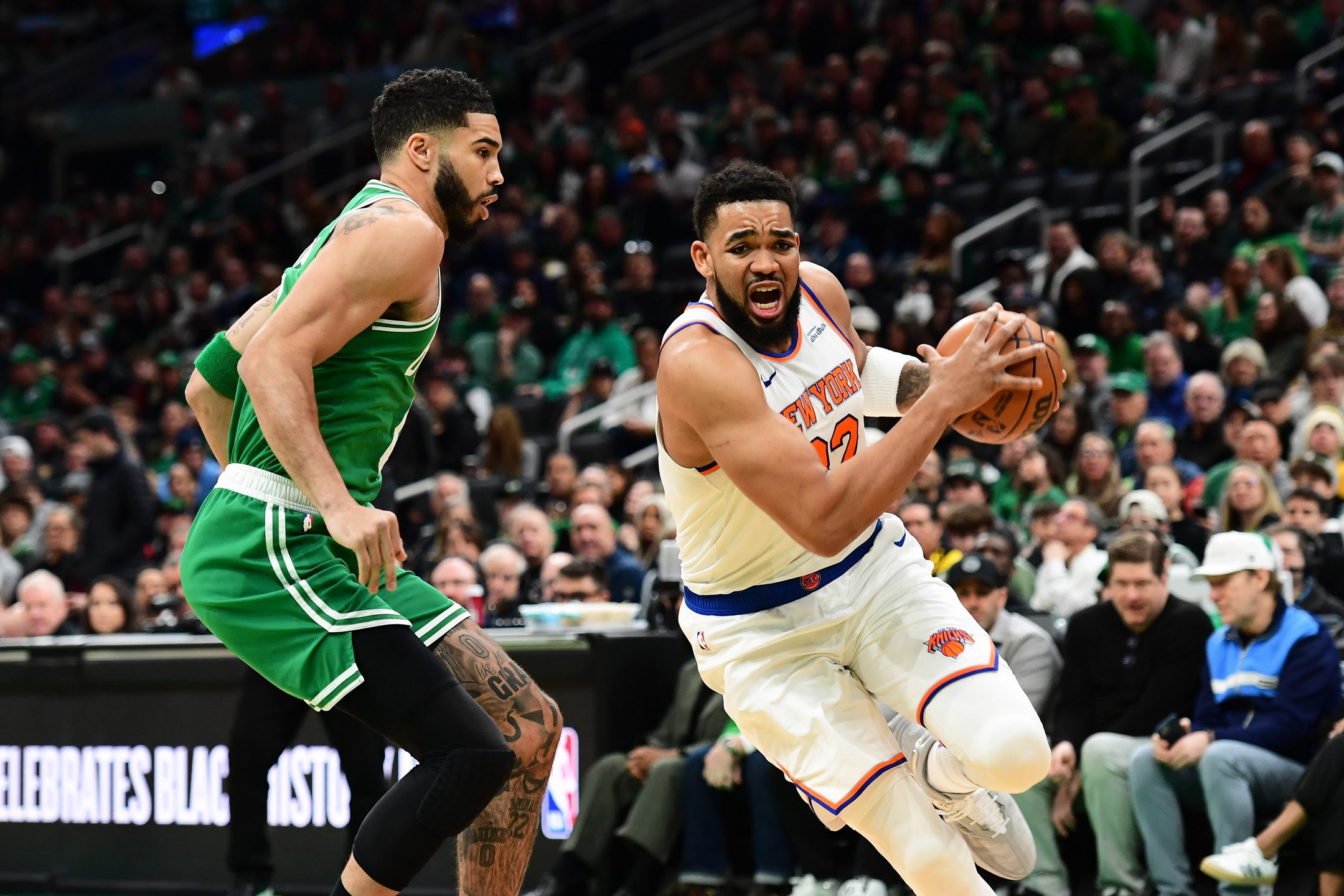 New York Knicks Achieve Wild Feat Not Seen in the Last 25 Seasons After Game 2 Win Vs. Boston Celtics 1 New York Knicks center Karl-Anthony Towns (32) controls the ball while Boston Celtics forward Jayson Tatum (0) defends during the first half at TD Garden.