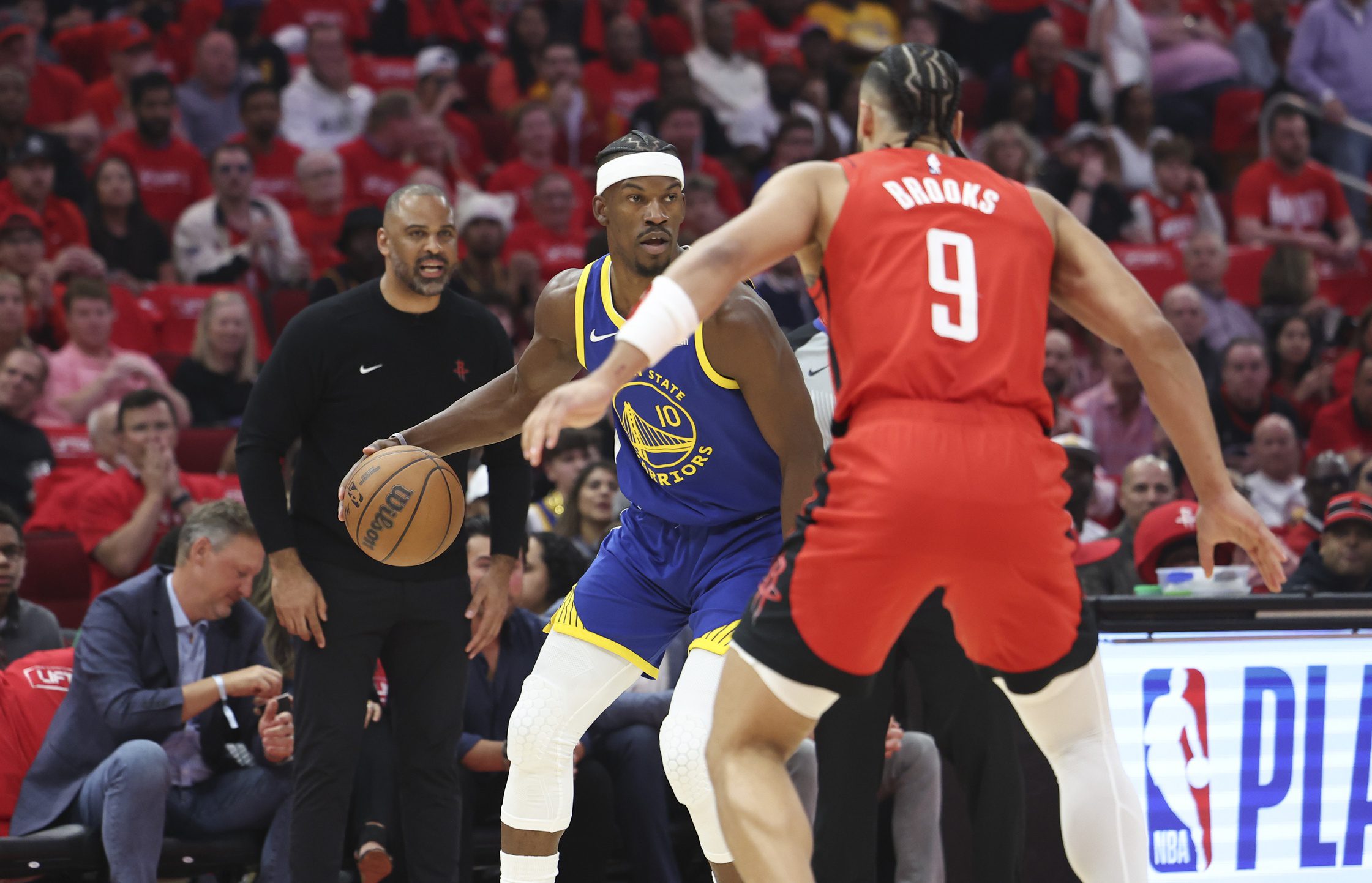 Golden State Warriors' Trade for Jimmy Butler More Impactful Than the Luka Doncic Deal, Per Analyst 2 Golden State Warriors forward Jimmy Butler III (10) controls the ball as Houston Rockets forward Dillon Brooks (9) defends during the first quarter at Toyota Center.