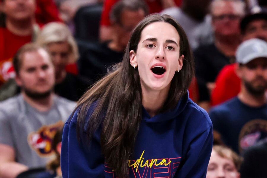 Indiana Fever guard Caitlin Clark (22) cheers on the team Thursday, June 26, 2025, during a game between the Indiana Fever and the Los Angeles Sparks at Gainbridge Fieldhouse in Indianapolis.