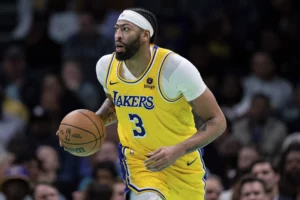 February 5th, 2024; Charlotte, North Carolina, USA; Los Angeles Lakers forward Anthony Davis brings the ball upcourt against the Charlotte Hornets during an NBA basketball game Monday. Mandatory Credit: Jacob Kupferman-AP Photo 