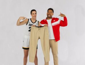 Iowa Hawkeyes basketball guard Caitlin Clark with Jake from State Farm. This is the first time State Farm has signed a collegiate player to its sports roster. Mandatory Credit: State Farm