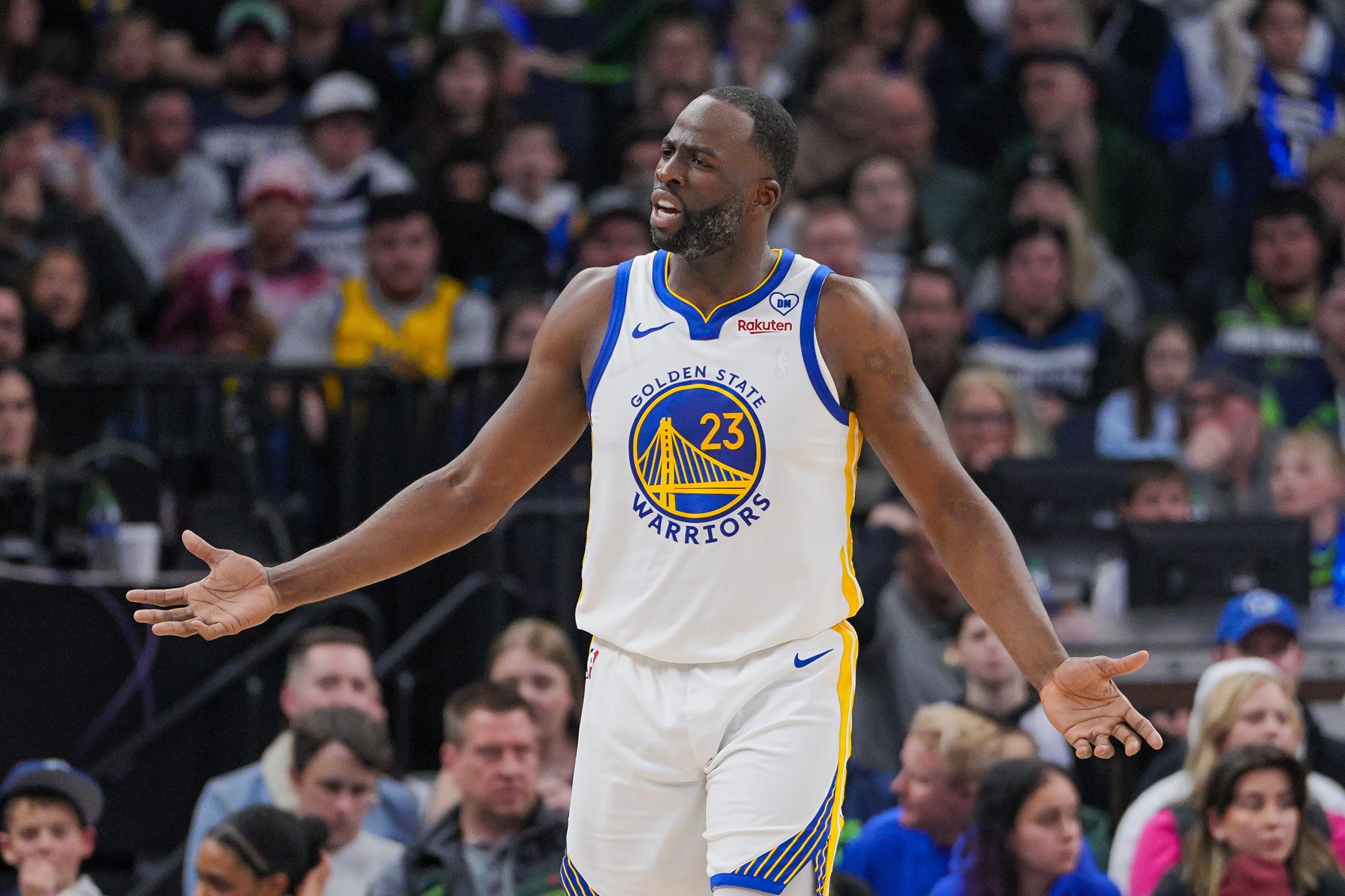 Mar 24, 2024; Minneapolis, Minnesota, USA; Golden State Warriors forward Draymond Green (23) complains about a call against the Minnesota Timberwolves in the third quarter at Target Center. Mandatory Credit: Brad Rempel-USA TODAY Sports