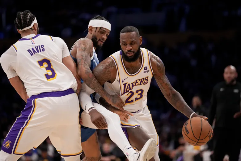March 10th, 2024; Los Angeles, California, USA; Los Angeles Lakers forward LeBron James uses a screen set by center Anthony Davis against the Minnesota Timberwolves at Crypto.com Arena. Mandatory Credit: Kiyoshi Mio-USA TODAY Sports