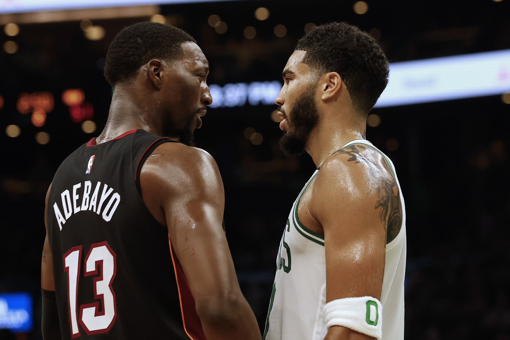 Oct 27, 2023; Boston, Massachusetts, USA; Miami Heat center Bam Adebayo (13) talks with Boston Celtics forward Jayson Tatum (0) during the second quarter at TD Garden. Mandatory Credit: Winslow Townson-USA TODAY Sports