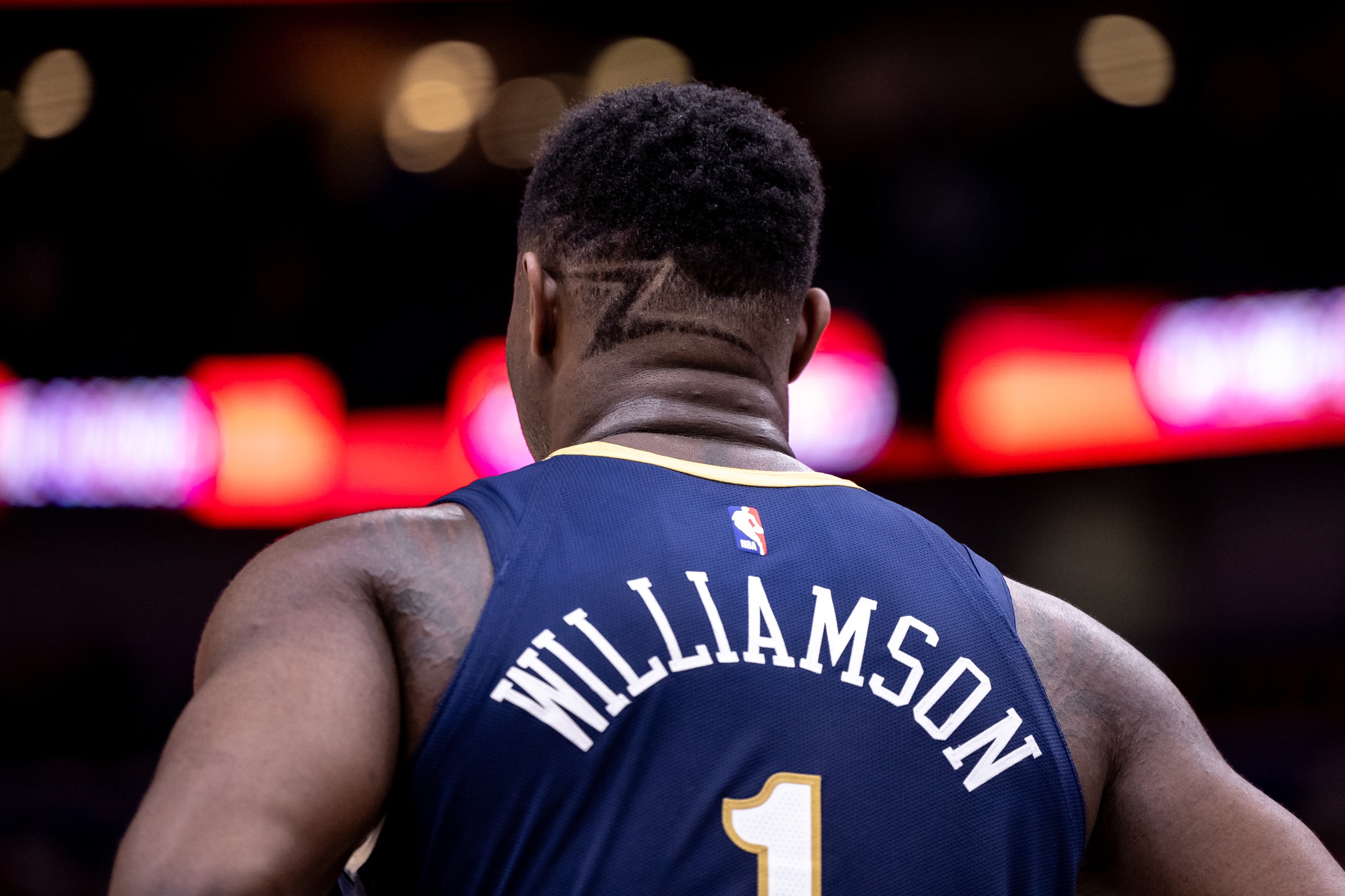 Apr 3, 2024; New Orleans, Louisiana, USA; Detailed view of the hair of New Orleans Pelicans forward Zion Williamson (1) against the Orlando Magic during the first half at Smoothie King Center. Mandatory Credit: Stephen Lew-USA TODAY Sports
