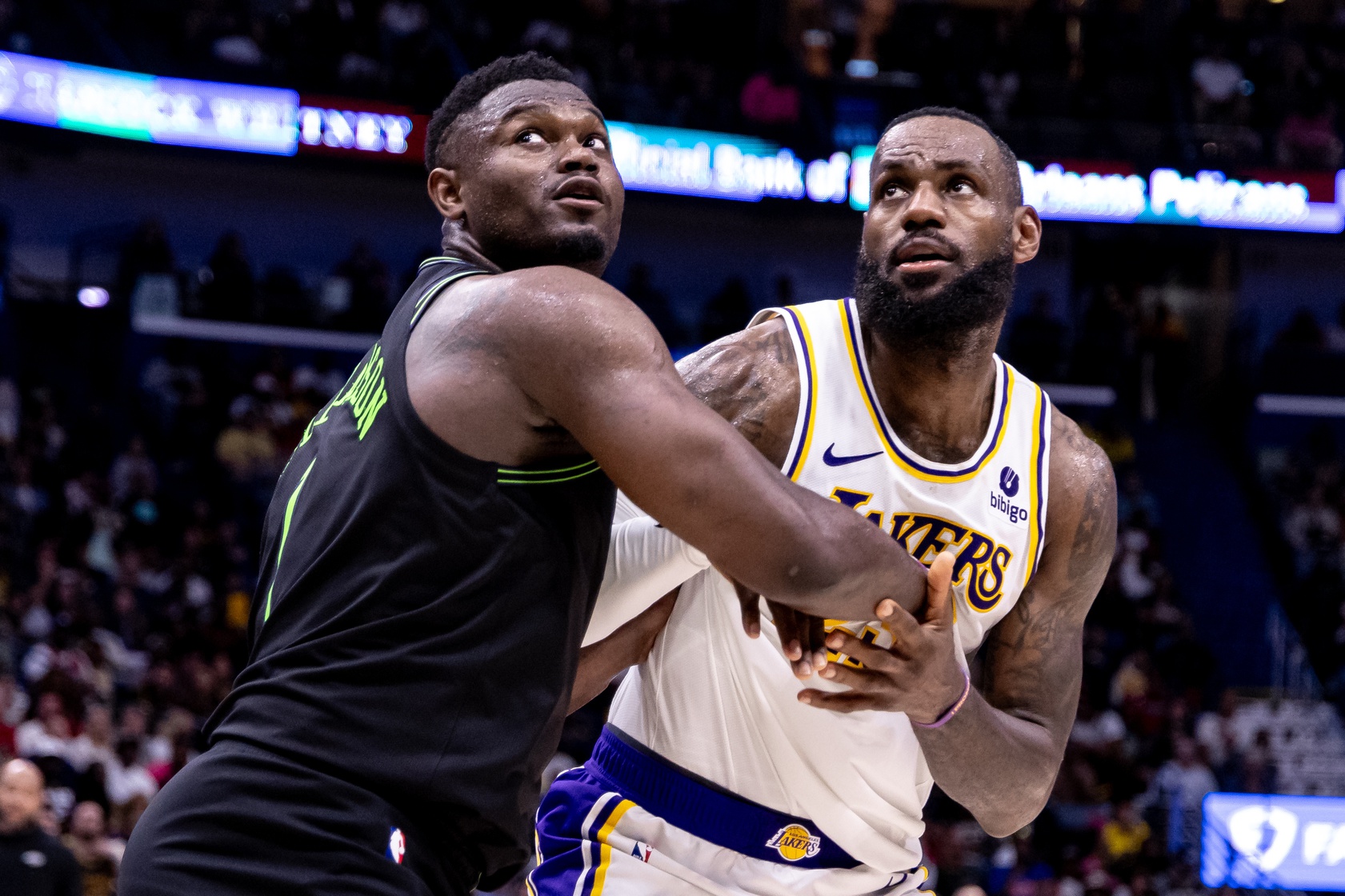 Apr 14, 2024; New Orleans, Louisiana, USA; Los Angeles Lakers forward LeBron James (23) and New Orleans Pelicans forward Zion Williamson (1) fight for position during the second half at Smoothie King Center. Mandatory Credit: Stephen Lew-USA TODAY Sports