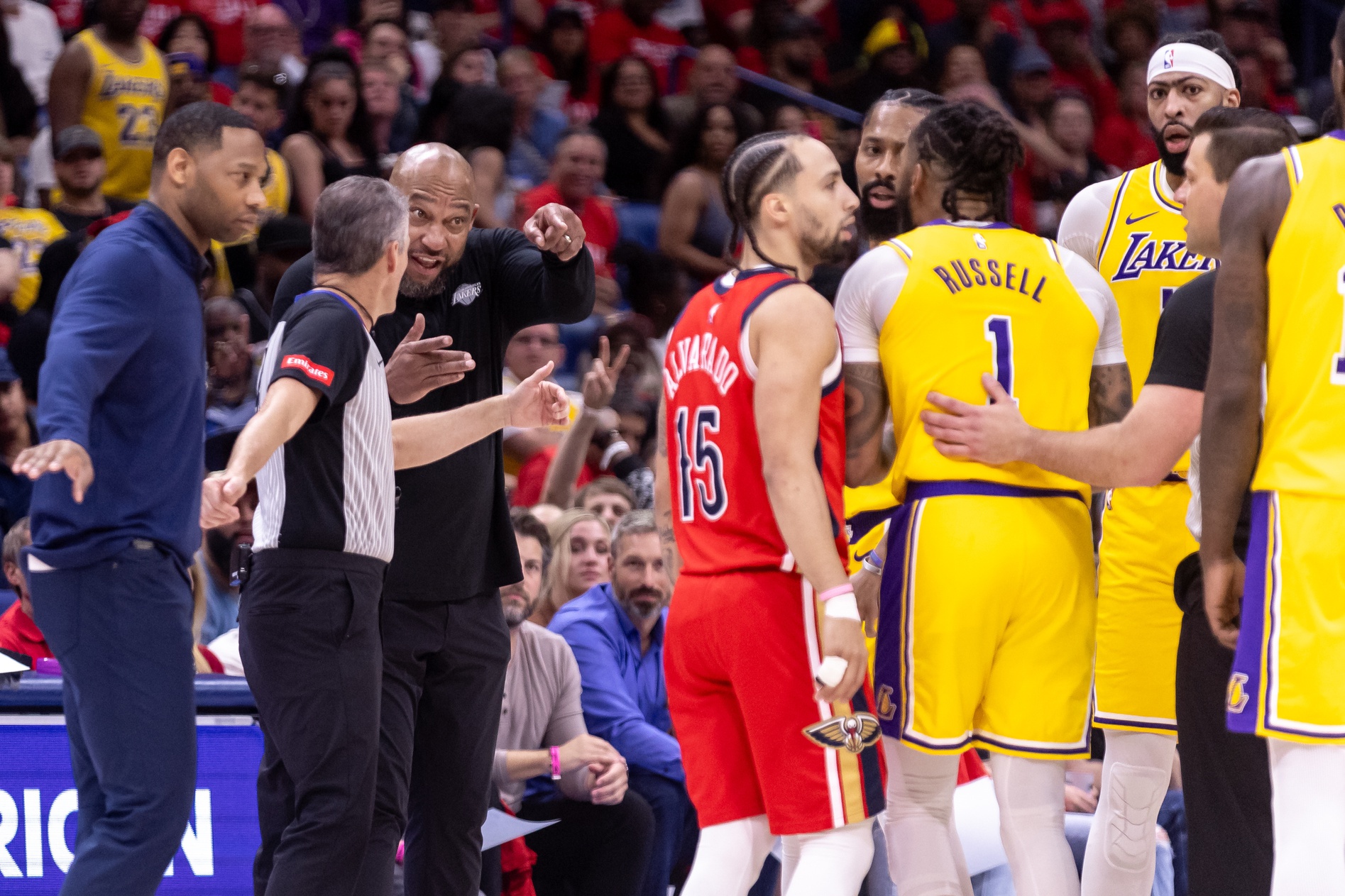 Apr 16, 2024; New Orleans, Louisiana, USA; Los Angeles Lakers head coach Darvin Ham points at New Orleans Pelicans guard Jose Alvarado (15) after a play involving guard D'Angelo Russell (1) during the first half of a play-in game of the 2024 NBA playoffs against the New Orleans Pelicans at Smoothie King Center. Mandatory Credit: Stephen Lew-USA TODAY Sports