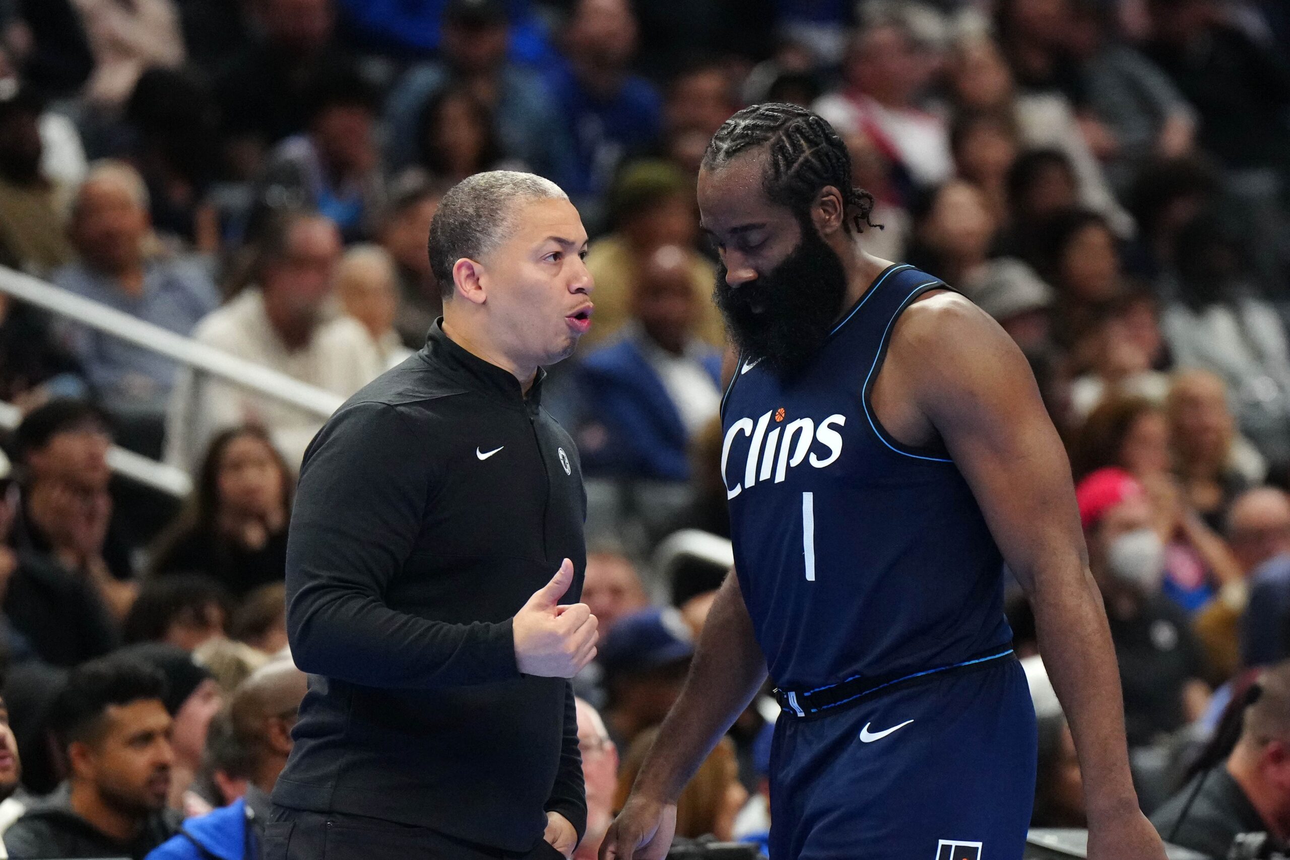 Nov 24, 2023; Los Angeles, California, USA; LA Clippers coach Tyronn Lue (left) and guard James Harden (1) react against the New Orleans Pelicans in the second half at Crypto.com Arena. Mandatory Credit: Kirby Lee-USA TODAY Sports