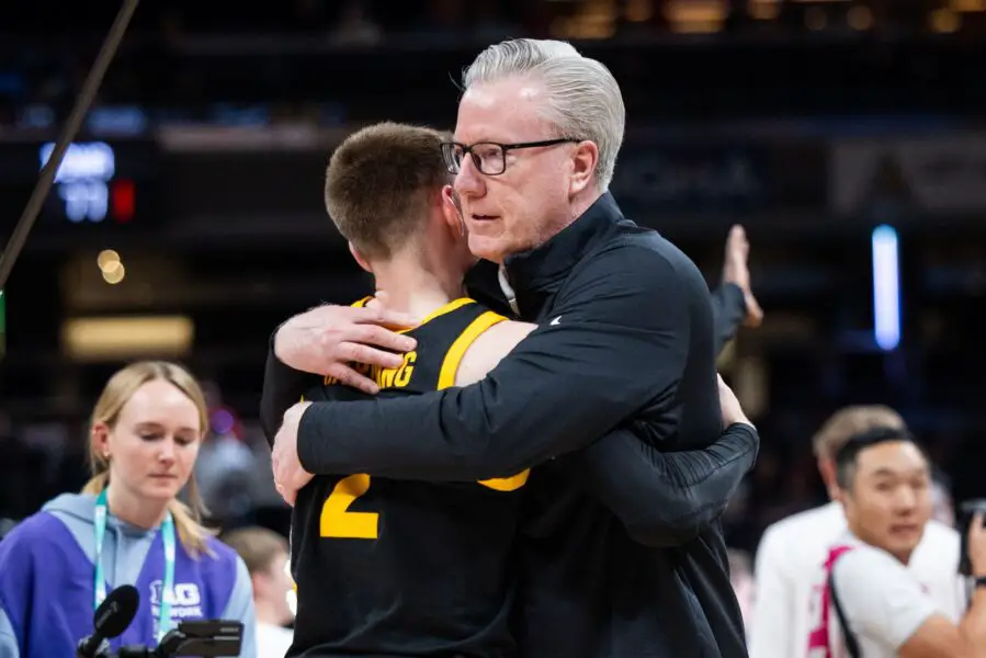 Major College Basketball Program Fires Coach After Ejection In Big Ten Tournament Loss 3 Iowa Hawkeyes head coach Fran McCaffery celebrates with guard Brock Harding (2)