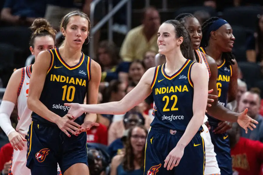 Jun 17, 2025; Indianapolis, Indiana, USA; Indiana Fever guard Caitlin Clark (22) and guard Lexie Hull (10) celebrate after a play in the second half against the Connecticut Sun at Gainbridge Fieldhouse. Mandatory Credit: Trevor Ruszkowski-Imagn Images